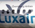 Luxair Bombardier Q400 Logo und Propellerschatten - Luxair verbindet Tegel direkt mit Saarbrücken. Foto: Luxair