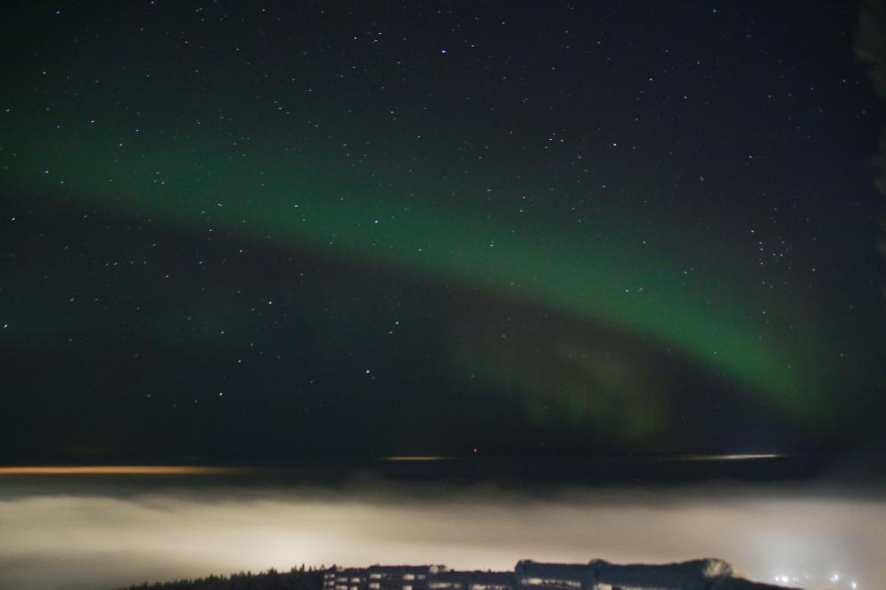 Polarlicht über Wolken